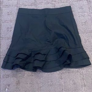 black ruffled mini skirt